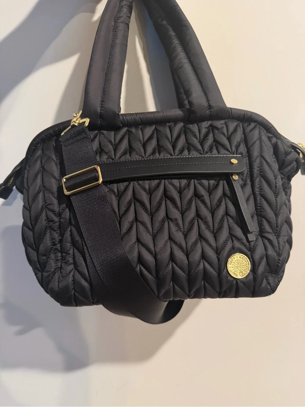 Quilted Black Nylon Baby Bag with Gold-Tone Accents